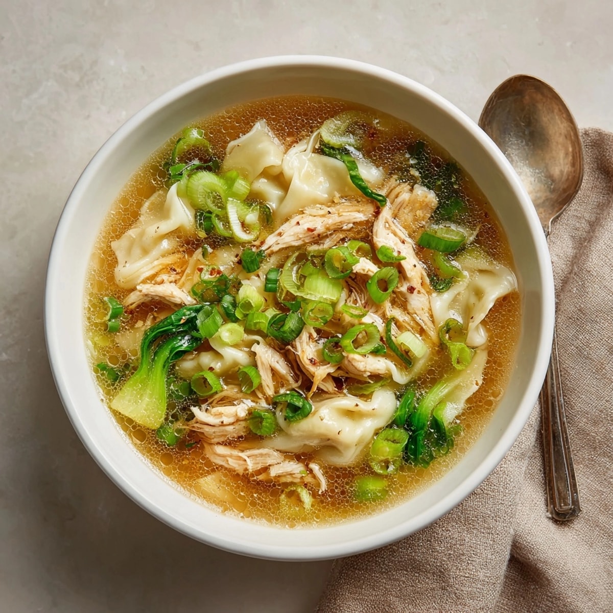 Hearty and warm, this homemade Simplified Wonton Soup is perfect for a quick weeknight dinner.