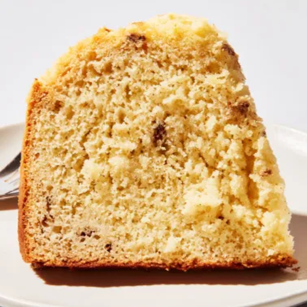 Homemade No-Oven Rice Cooker Cake, serve warm with whipped cream and berries.