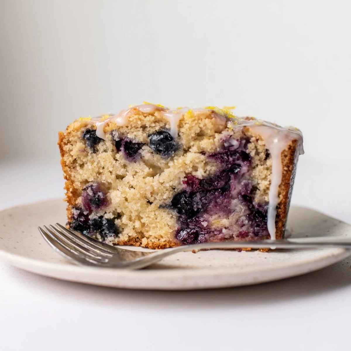 Fluffy pancake bread loaded with fresh blueberries and zesty lemon, ideal for brunch.  