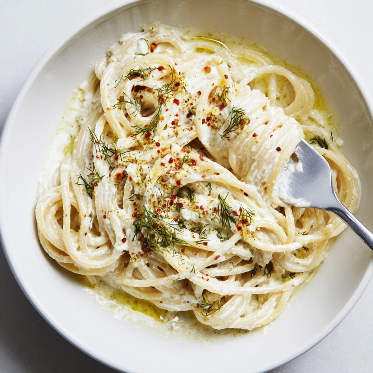 Rich Turkish garlic yogurt pasta, drizzled with vibrant spiced butter sauce.  