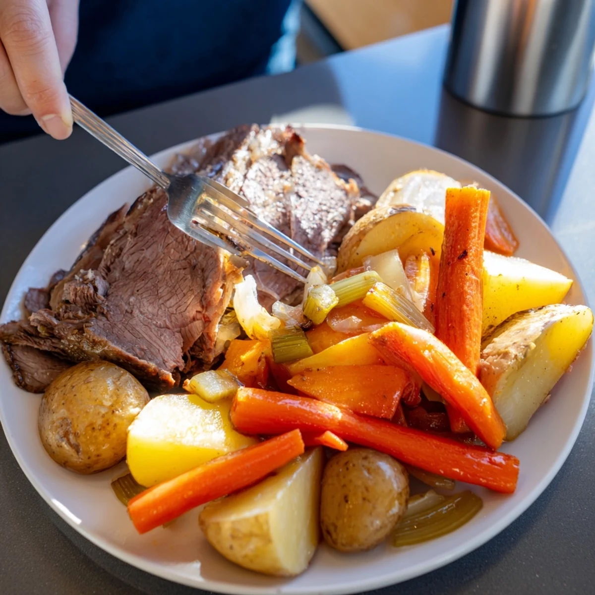 Sizzling Sunday Pot Roast, featuring beautifully browned beef and vibrant, roasted vegetables.