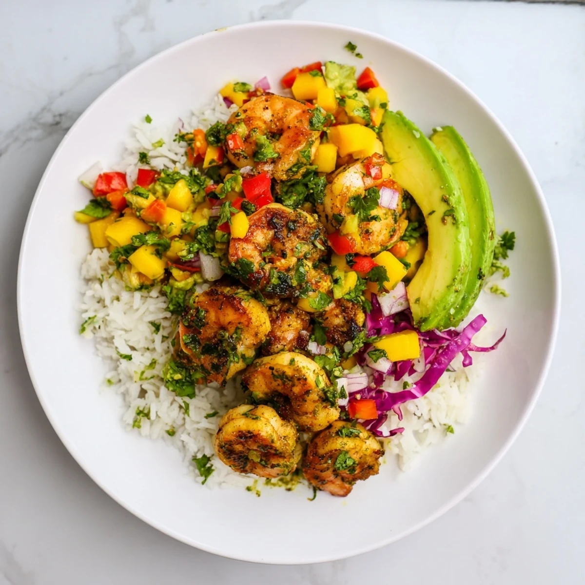 Enjoy a healthy serving of Cilantro Lime Shrimp & Mango Salsa Bowls with a vibrant tropical presentation.
